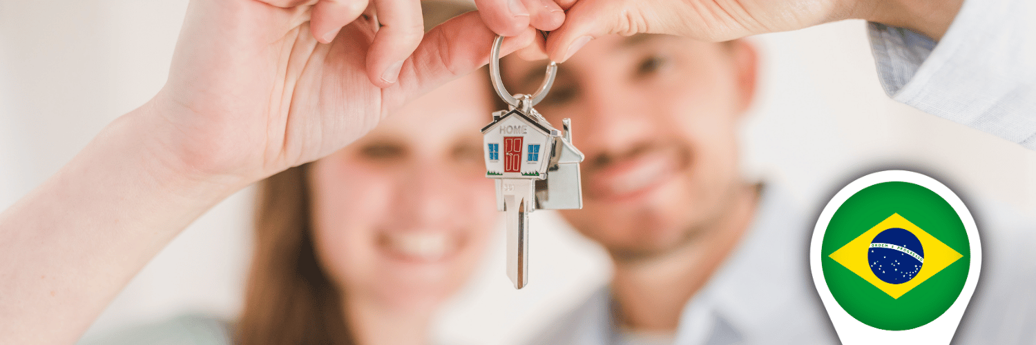 Couple holding keys inside a brand‑new apartment, showing the positive side of a successful off‑plan purchase in Brazil