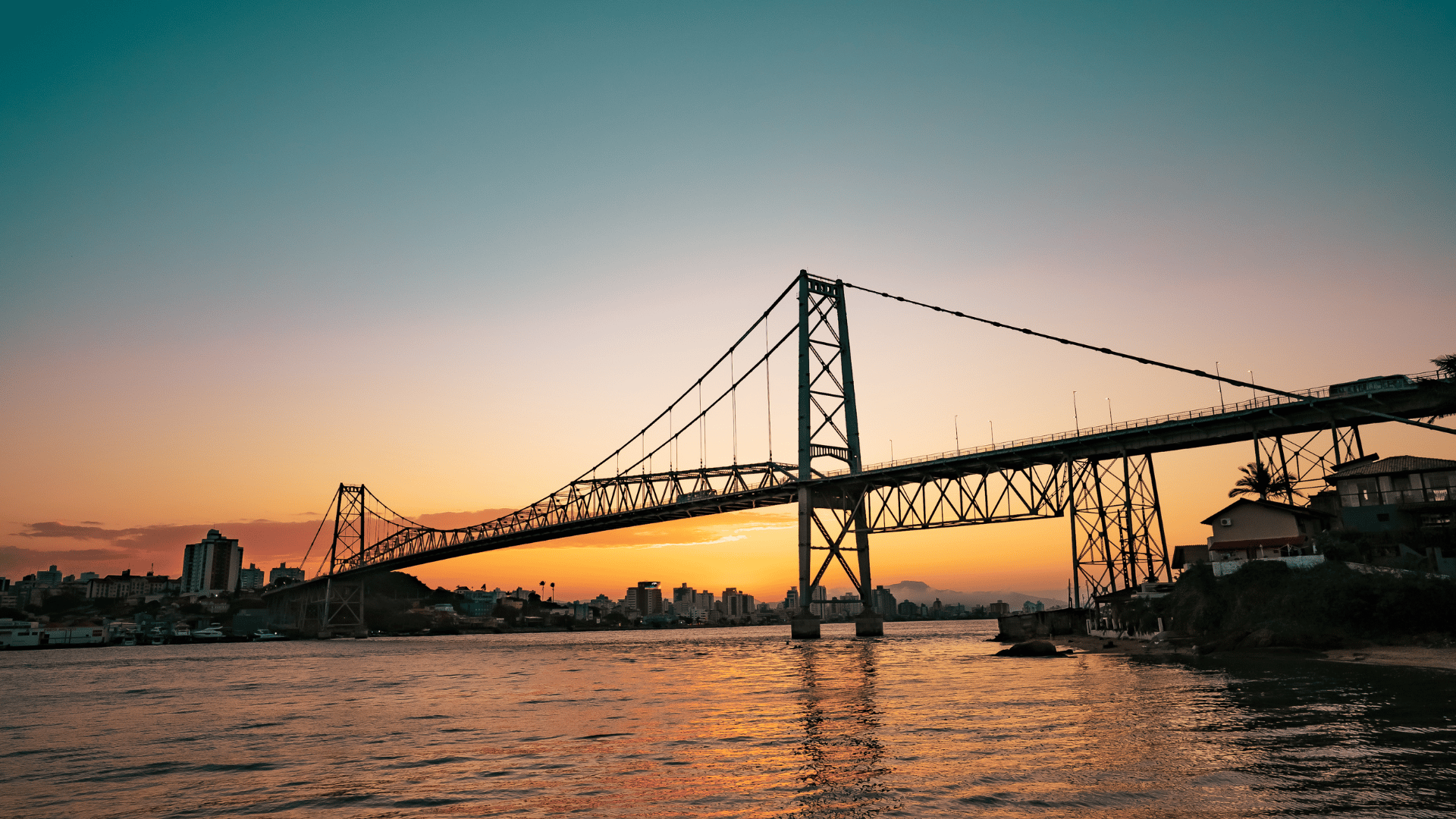 Ponte Hercรญlio Luz, the longest suspension bridge in Brazil _ Photo by_ Merlin Donald
